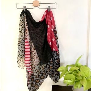 Fun printed scarf. Very soft and airy.